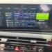Lumora mostrando una guía IPTV en la pantalla de un coche con Android Auto