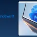 Equipo con Windows 11 y su barra de tareas visible junto al logotipo del sistema