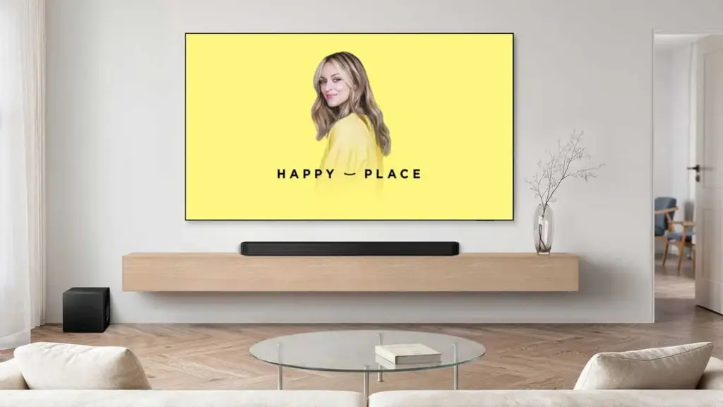 Televisor con Happy Place en pantalla