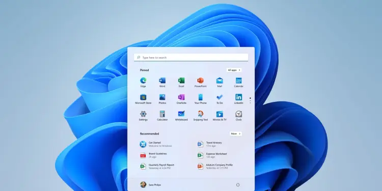 Menú Inicio de Windows 11 sobre el escritorio del sistema