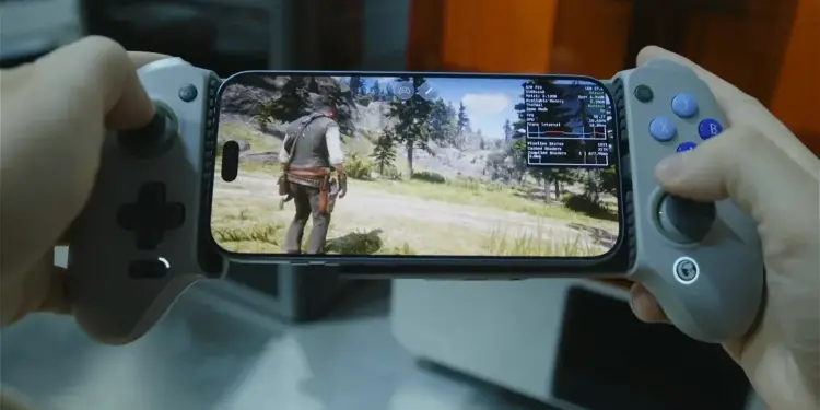 Teléfono con Red Dead Redemption 2 entre dos mandos