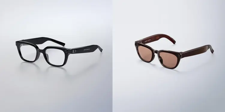 Gafas inteligentes negras y marrones sobre fondo claro