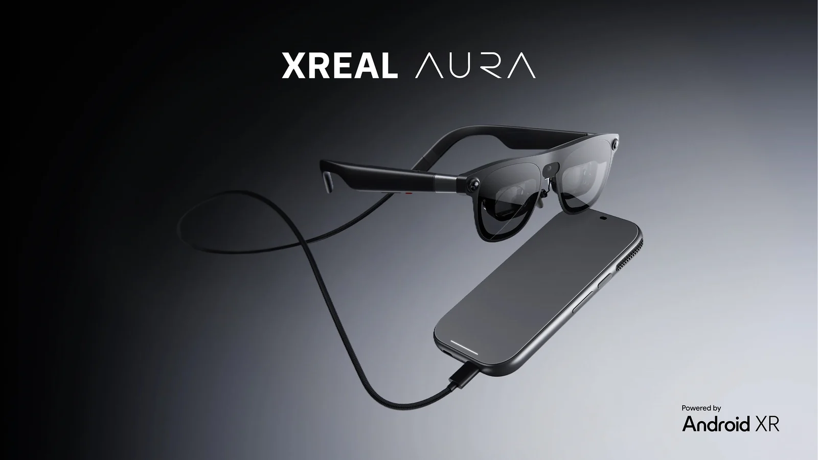 Gafas XREAL AURA y módulo conectados por cable